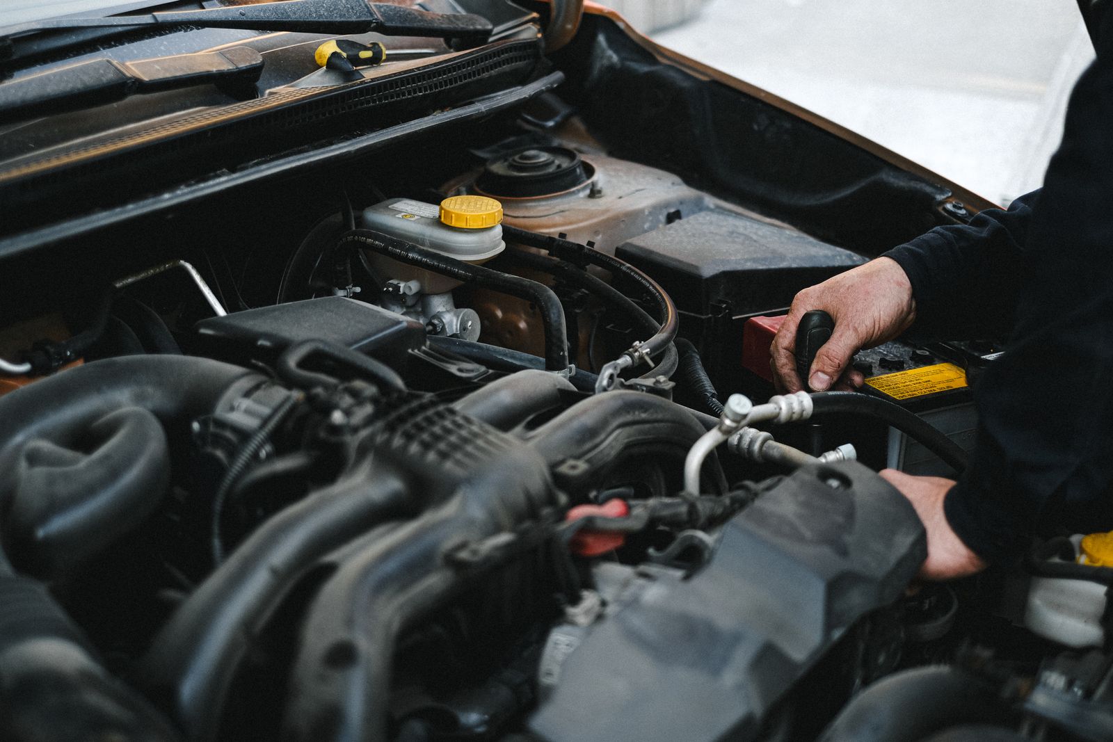 Inspector checking a fleet vehicle before return